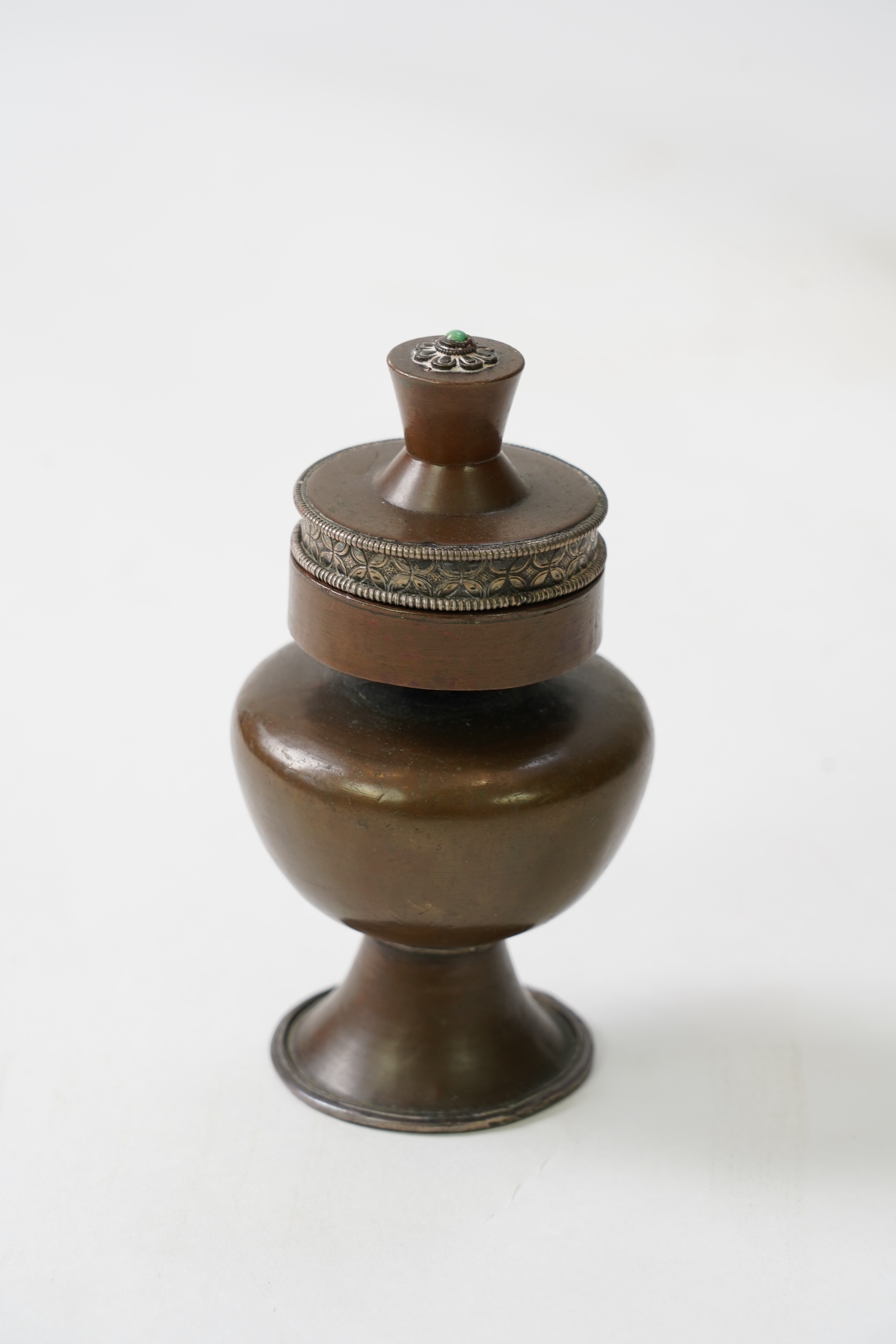 A Tibetan copper and silver mounted ink-stand, 19th century